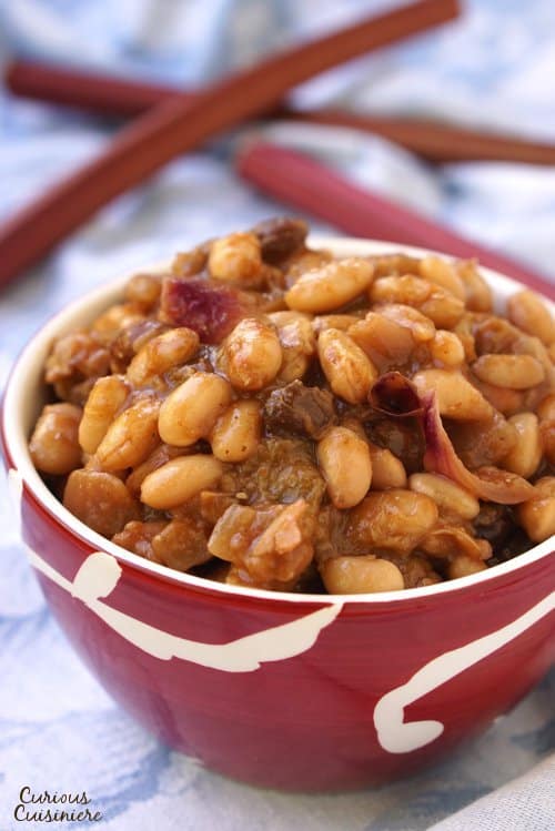 While unexpected, our Rhubarb Baked Beans are lightly sweet, slightly tart, and the perfect recipe for a light summer side dish. | www.CuriousCuisiniere.com