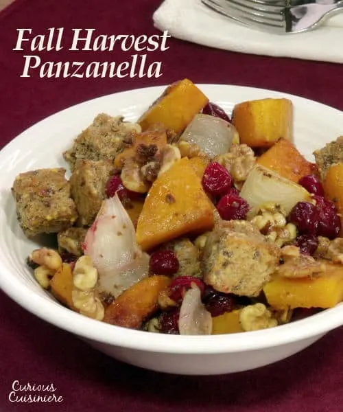 Roasted butternut squash and nutty grain bread make this spin on a Tuscan Panzanella a carnival of fall harvest flavors. | www.curiouscuisiniere.com