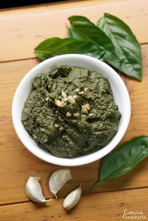 You don't have to wait until summer's harvest to enjoy fresh basil pesto! This basic pesto recipe is perfect for freezing so you can enjoy it all year long. | www.CuriousCuisiniere.com