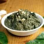 You don't have to wait until summer's harvest to enjoy fresh basil pesto! This basic pesto recipe is perfect for freezing so you can enjoy it all year long. | www.CuriousCuisiniere.com
