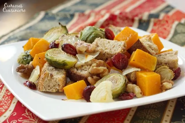 Italian Fall Butternut Squash Panzanella Bread Salad on a Fall colored runner. 