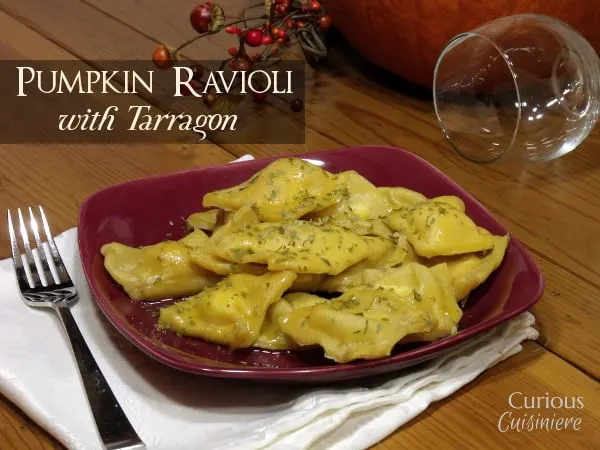Pumpkin infused pasta makes the perfect vessel for a creamy tarragon-spiced cheese filling in this pumpkin ravioli recipe. | www.curiouscuisiniere.com 