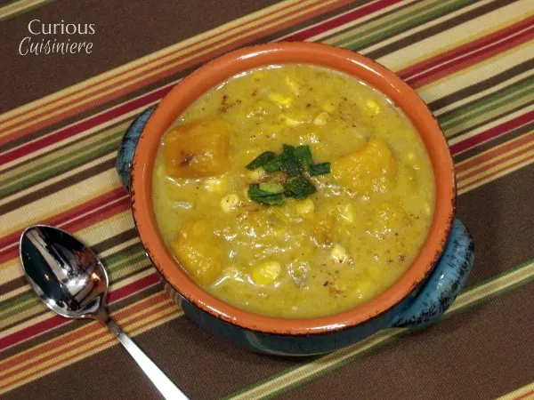 Classic New England Chowder takes on a healthy, fall spin in this Pumpkin Corn Chowder recipe.  | www.CuriousCuisiniere.com