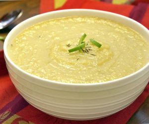 A slightly sweet and immensely comforting recipe for a fall soup, this Roasted Parsnip Apple Soup is sure to warm those cool fall days.  | www.CuriousCuisiniere.com