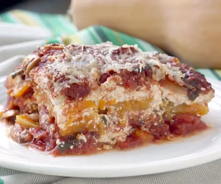 This Butternut Squash Lasagna gives noodleless lasagna a whole new fall twist! Try our tasty, vegetarian recipe today! | www.CuriousCuisiniere.com