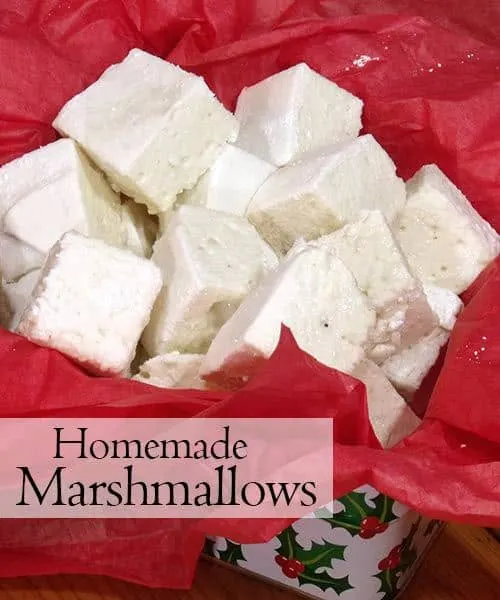 These homemade marshmallows are super fluffy and don't leave you tangled in a sticky, stringy mess. They're the perfect addition to winter hot chocolate! | www.CuriousCuisiniere.com 