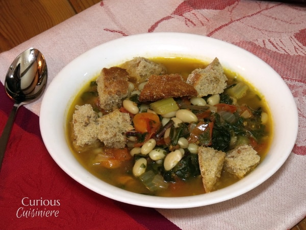 This hearty Tuscan Ribollita is a hearty vegetable aand bean stew that gets better the second day, so make up a big batch to have on hand for those cold winter nights! -- Curious Cuisiniere
