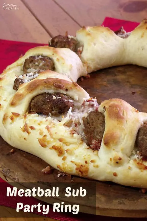 The classic meatball sub, transformed into a stunning dish to serve a crowd. Perfect for game day or any party day! | www.CuriousCuisiniere.com
