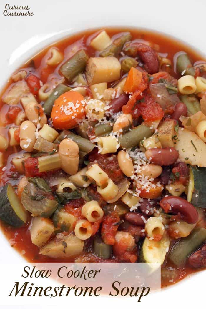 Our crock pot Minestrone is not a wimpy soup. Full of chunky vegetables and laden with herbs, this is some serious comfort food made easy in your slow cooker. | www.CuriousCuisiniere.com