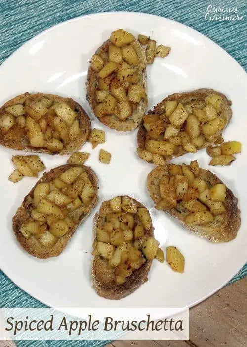 Sweet honey and warm spices make for a delicious fall dessert in this Spiced Apple Bruschetta. | www.curiouscuisiniere.com