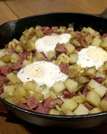Corned Beef Hash is a hearty way to start off your day, and the perfect, simple use for leftover corned beef. | www.CuriousCuisiniere.com