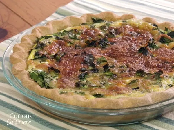 A French dish with Italian inspiration, Quiche Florentine is an elegant, yet easy, spring-inspired dish. | www.CuriousCuisiniere.com