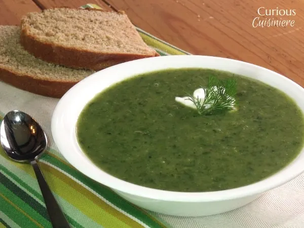 This green soup is traditionally served on Holy Thursday. With a mix of fresh herbs and greens, it is Herb Soup perfect for spring. | Curious Cuisiniere