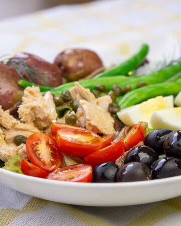 French Salade Nicoise (Nicoise Salad) with boiled potatoes and anchovies