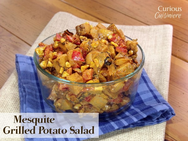 Healthy potato salad gets a smoky spin with the help of grilled veggies tossed in a mesquite dressings. This Grilled Potato Salad is the perfect recipe for your next summer cookout. | www.CuriousCuisiniere.com