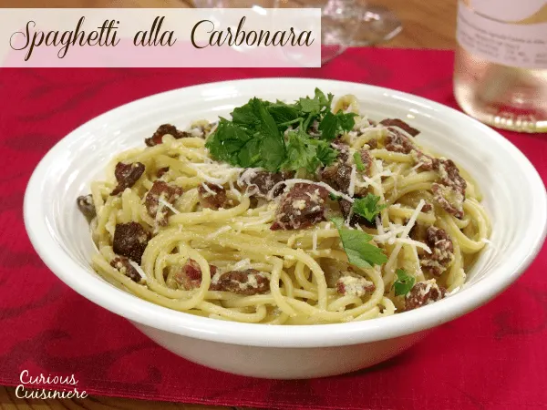 There's nothing not to love about bacon, cheese, and pasta that make up this classic and easy Spaghetti alla Carbonara recipe. | Curious Cuisiniere