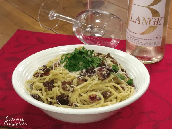 There's nothing not to love about bacon, cheese, and pasta that make up this classic and easy Spaghetti alla Carbonara recipe. | Curious Cuisiniere