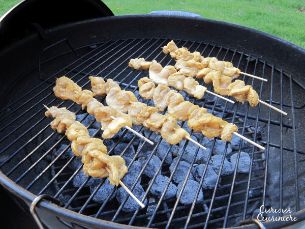 Hand-held skewers of tender Malaysian Satay, served with a nutty Peanut Sauce bring an exotic flair to your summer BBQ.| Curious Cuisiniere