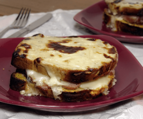 The French version of a grilled cheese brings ham, Dijon mustard, Swiss cheese, and a creamy sauce together in one epic sandwich.