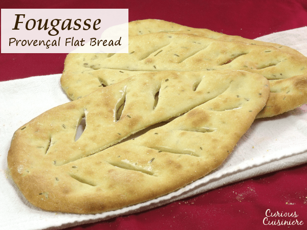 Flat, crusty Fougasse bread from the south of France is perfect for an appetizer or as an accompaniment to a summer meal. | www.CuriousCuisiniere.com