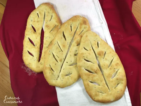 Flat, crusty Fougasse bread from the south of France is perfect for an appetizer or as an accompaniment to a summer meal. | www.CuriousCuisiniere.com