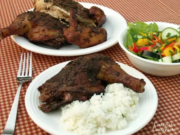 Spicy, herby, slightly sweet. This Jamaican Jerk Chicken recipe adds the perfect Caribbean flair to a summer cookout. | www.CuriousCuisiniere.com 