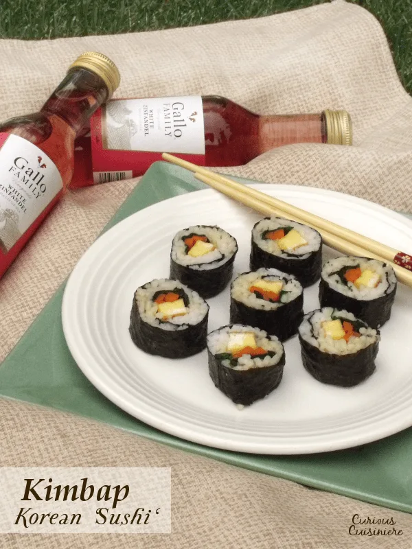 Similar in style to Japanese sushi, Korean Kimbap has a mildly nutty flavor and are packed with veggies, eggs, even cooked meats. They are perfect to pack along for a summer picnic! #SundaySupper