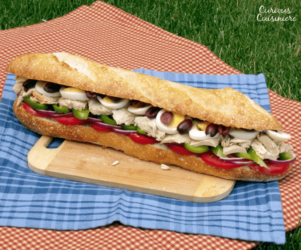 The Pan Bagnat is the French take on a tuna sandwich that is perfect for packing up for your next summer picnic. | www.CuriousCuisiniere.com 