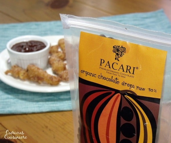Light and crispy fried churros dipped in a warm, rich chocolate. Perfect for breakfast or an afternoon snack. | www.curiouscuisiniere.com