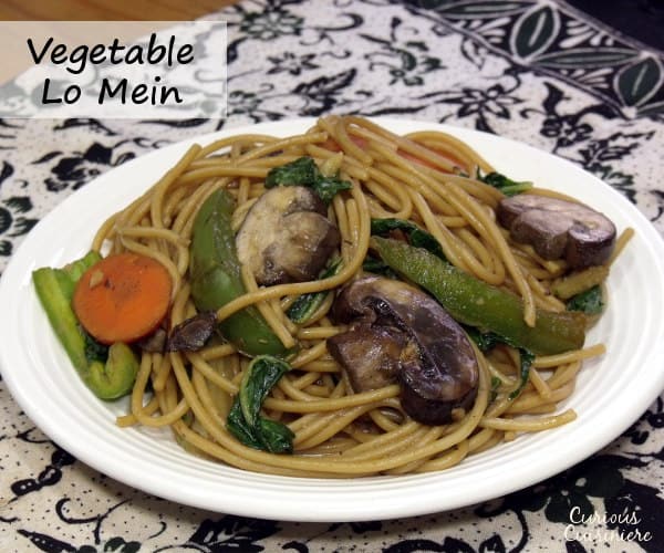 This easy Chinese noodle dish is full of veggies and quick to make than calling for takeout! | www.curiouscuisiniere.com