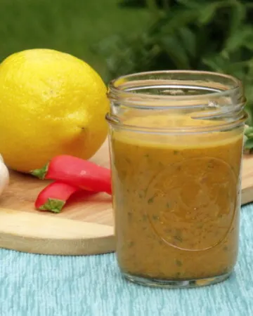 Bright lemon and spicy chilies come together in this incredibly versatile hot sauce recipe. | www.curiouscuisiniere.com