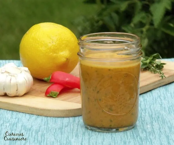 Bright lemon and spicy chilies come together in this incredibly versatile hot sauce recipe. | www.curiouscuisiniere.com