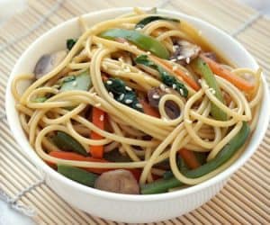 Lo Mein is a classic Chinese takeout noodle dish that is quick and easy to make at home. This homemade vegetable lo mein is even more flavorful and definitely healthier than takeout! | www.CuriousCuisiniere.com