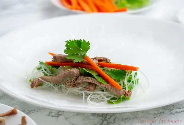 Rice paper wrapper with filling before rolling Vietnamese fresh spring rolls.