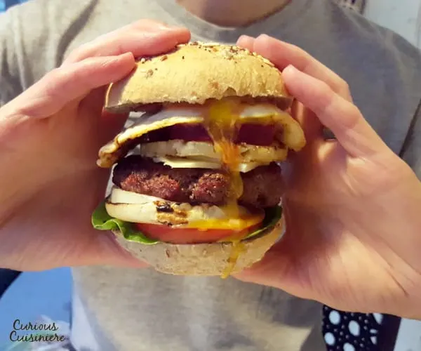 You haven't met a loaded burger until you try this Australian classic. They call it a burger with "the lot." And once you see the list of toppings, you'll know why. | www.curiouscuisiniere.com