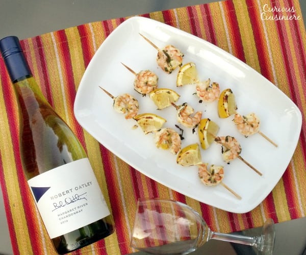 Lemon and parsley create the perfect bright marinade for these summery grilled shrimp. | www.curiouscuisiniere.com