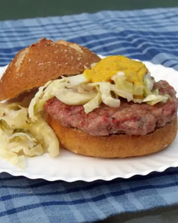 The flavor of the brat, the comfort of a burger. Perfect for your tailgate or any cookout! | www.curiouscuisiniere.com