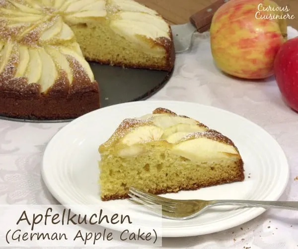 Fluffy and buttery cake topped with apples slices, Apfelkuchen, or German Apple Cake, is a perfect fall dessert. | www.curiouscuisiniere.com