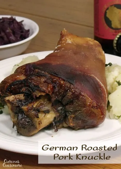 Schweinshaxe, or tender and juicy pork knuckle wrapped in a salty and roasted-crisp skin, is the quintessential Oktoberfest feast, perfect for pairing with a big stein of your favorite beer. | www.curiouscuisiniere.com 