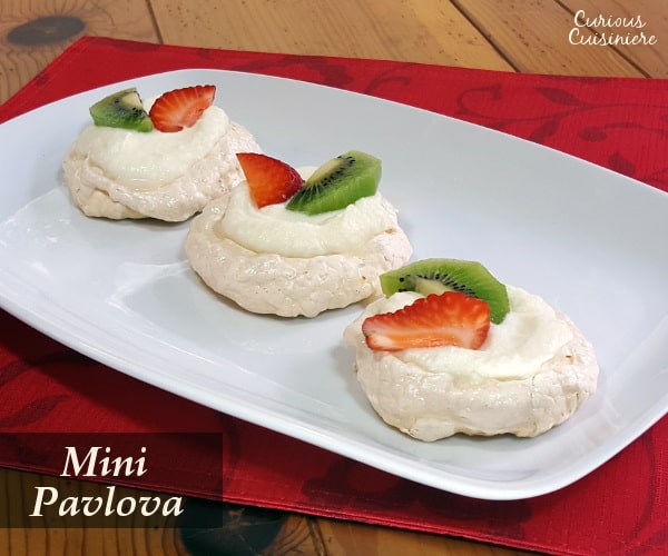 Light and airy, crisp on the outside and chewy at the center. Pavlova aren't just any meringue. | www.curiouscuisiniere.com