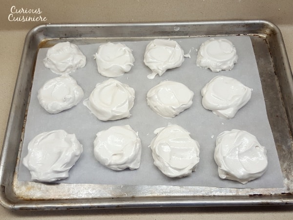 Meringues all lined up and ready for the oven. They will expand a bit as they bake. | www.curiouscuisiniere.com