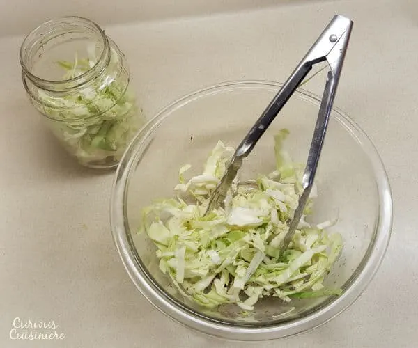 Cabbage and salt are all you need to make small batches of this authentic German sauerkraut at home. | www.curiouscuisiniere.com