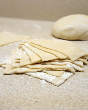 Perfect for egg rolls, wontons, dumplings, ravioli, and more. These homemade wonton wrappers are easy to make and freeze well. | www.curiouscuisiniere.com