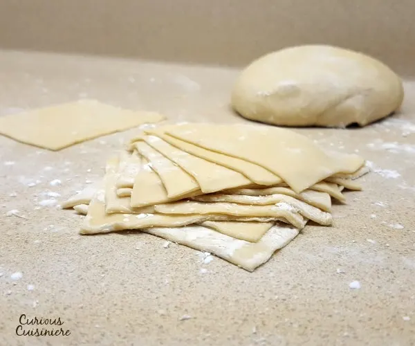 Perfect for egg rolls, wontons, dumplings, ravioli, and more. These homemade wonton wrappers are easy to make and freeze well. | www.curiouscuisiniere.com