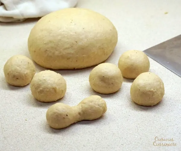 Premium Photo  Dead bread dough on a scale to weigh the poricones of the  bread