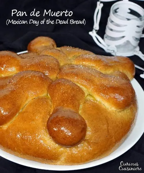 Pan de Muerto is a light and sweet Mexican Day of the Dead bread, traditionally spiced with ground anise and brushed with an orange glaze.