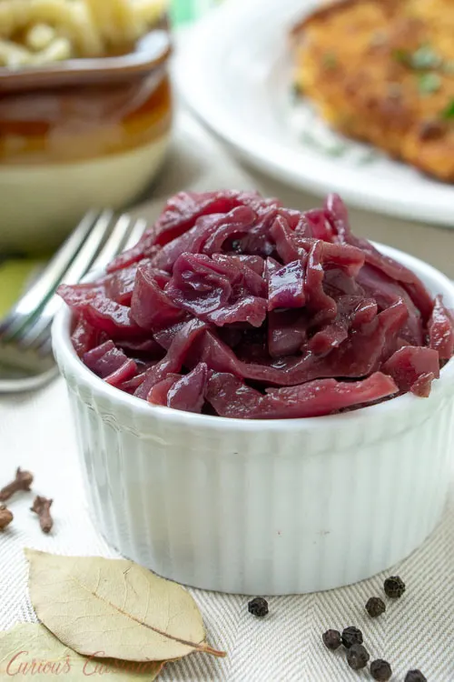 Blaukraut, German Red Cabbage, in a small bowl served with schnitzel and spaetzle. 