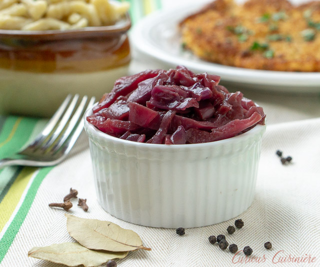 German Blaukraut Braised Red Cabbage in a small bowl served with schnitzel. 