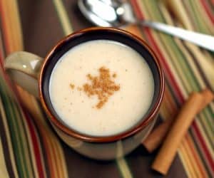 A warming drink perfect for winter, this Mexican Atole recipe is full of the comforting flavors of vanilla and cinnamon. | www.CuriousCuisiniere.com