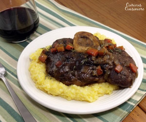 Fall apart, tender beef braised in red wine and vegetables pairs perfectly with a juicy and robust Merlot wine. | www.curiouscuisiniere.com